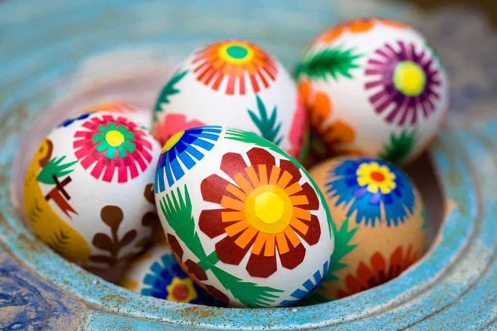 A basket full of painted Easter eggs